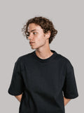 Black oversized boxy T-shirt worn by a male model